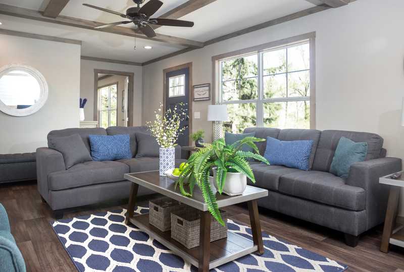 Two couches in the living room of The Aimee home