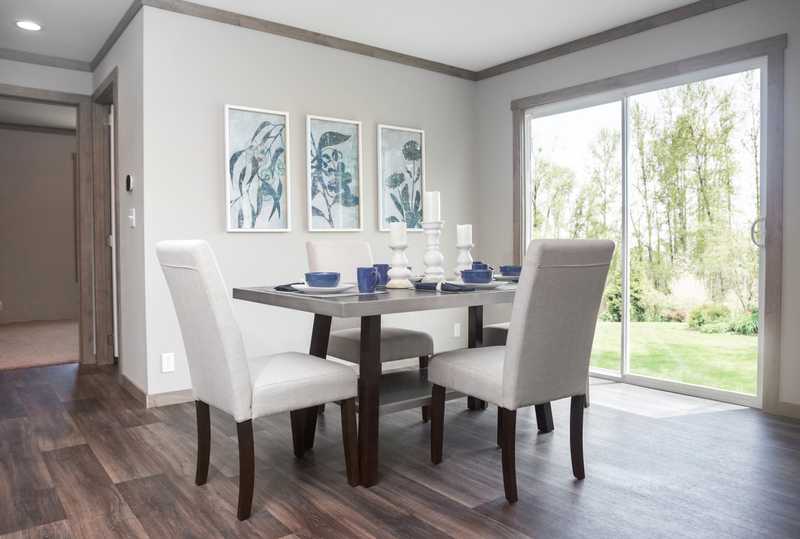 Dining Room of the Aimee with table and sliding door